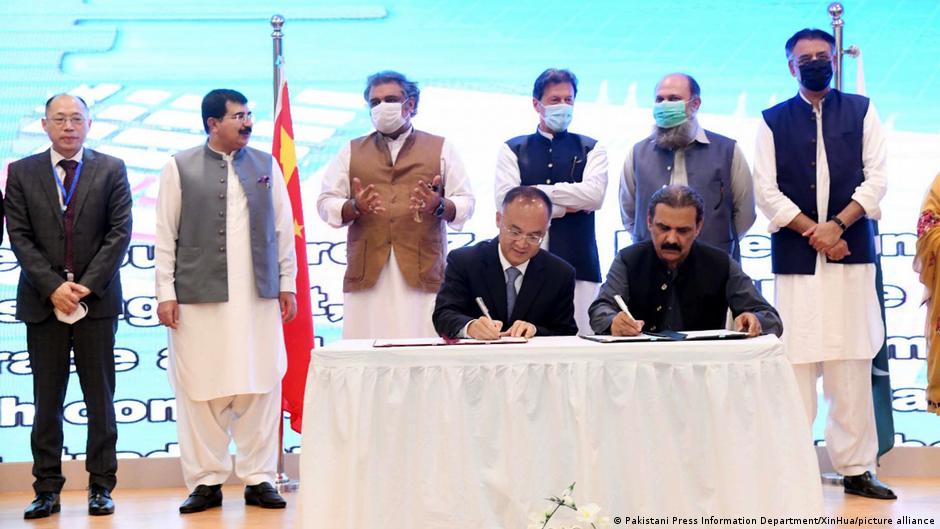 Pakistani Prime Minister Imran Khan (centre, rear) witnesses a signing ceremony of a Memorandum of Understanding between China and Pakistan in Gwadar, Pakistan, on 5 July 2021 (photo: Pakistani Press Information Department/Xinhua)