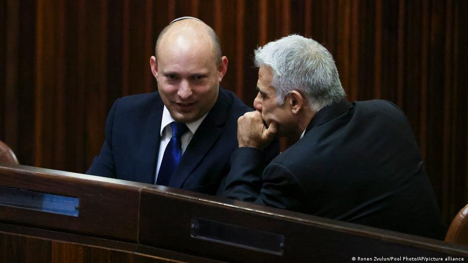 Israeli Prime Minister Naftali Bennett with Foreign Minister Yair Lapid (photo Ronen Zvulun/Pool Photo/AP/picture alliance)