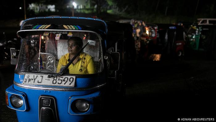 Lasanda Deepthi is 43 years old and is one of the few women who drive an auto-rickshaw, also called a tuktuk, in Sri Lanka (photo: REUTERS/Adnan Abidi)