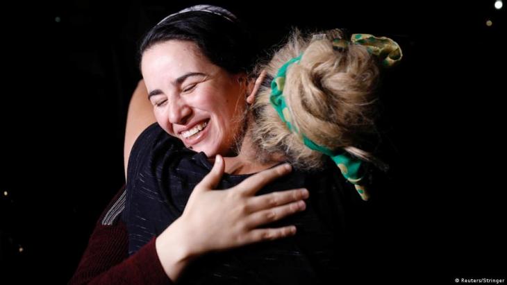 Hajar Raissouni celebrates after her release from prison (photo: Reuters)