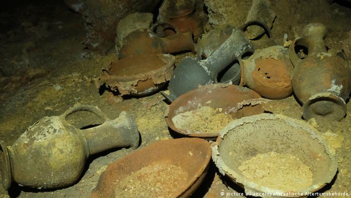 Ancient pottery covered in sand.