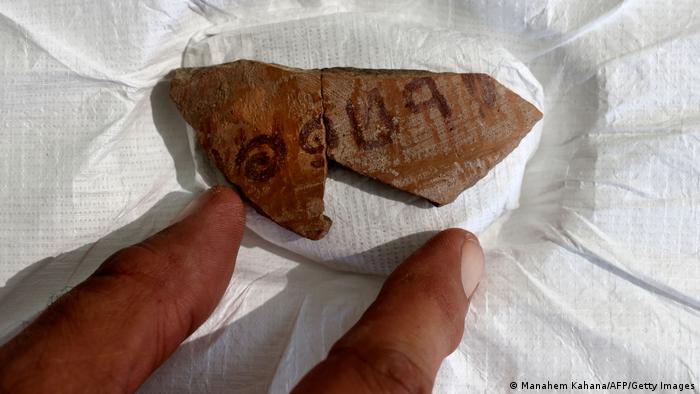 Pottery fragment with inscription.