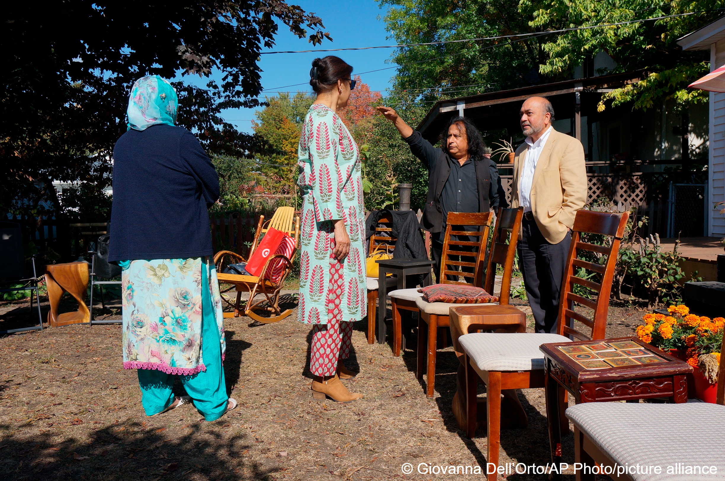 Zafar Siddiqui, right, and other members of the “India Coalition” group gather at the Minneapolis home of Dipankar Mukherjee, second right, and Meena Natarajan on 9 October 2022. The group – representing believers in different faiths as well as atheists – meets monthly to discuss how to prevent religious tensions in India from spreading to the Indian diaspora in the United States (photo: AP Photo/Giovanna Dell’Orto)