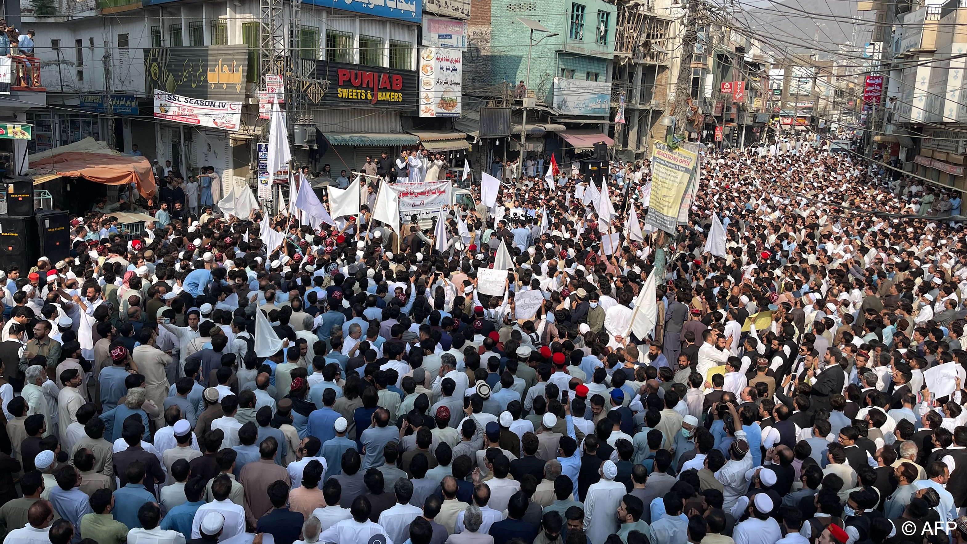 People take part in a protest a day after an attack on a school bus in Mingora, in the Swat District of Khyber Pakhtunkhwa in October (photo: AFP/File) 
