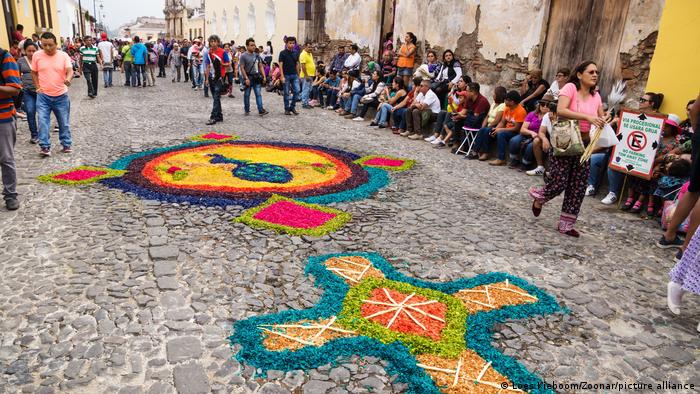 A street in Guatemala is decorated with colourful flowers to commemorate Christ during Holy Week