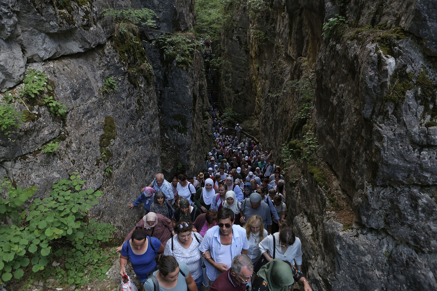 Pilgrims make their way through the rocky chasm (photo: Konstantin Novakovic)