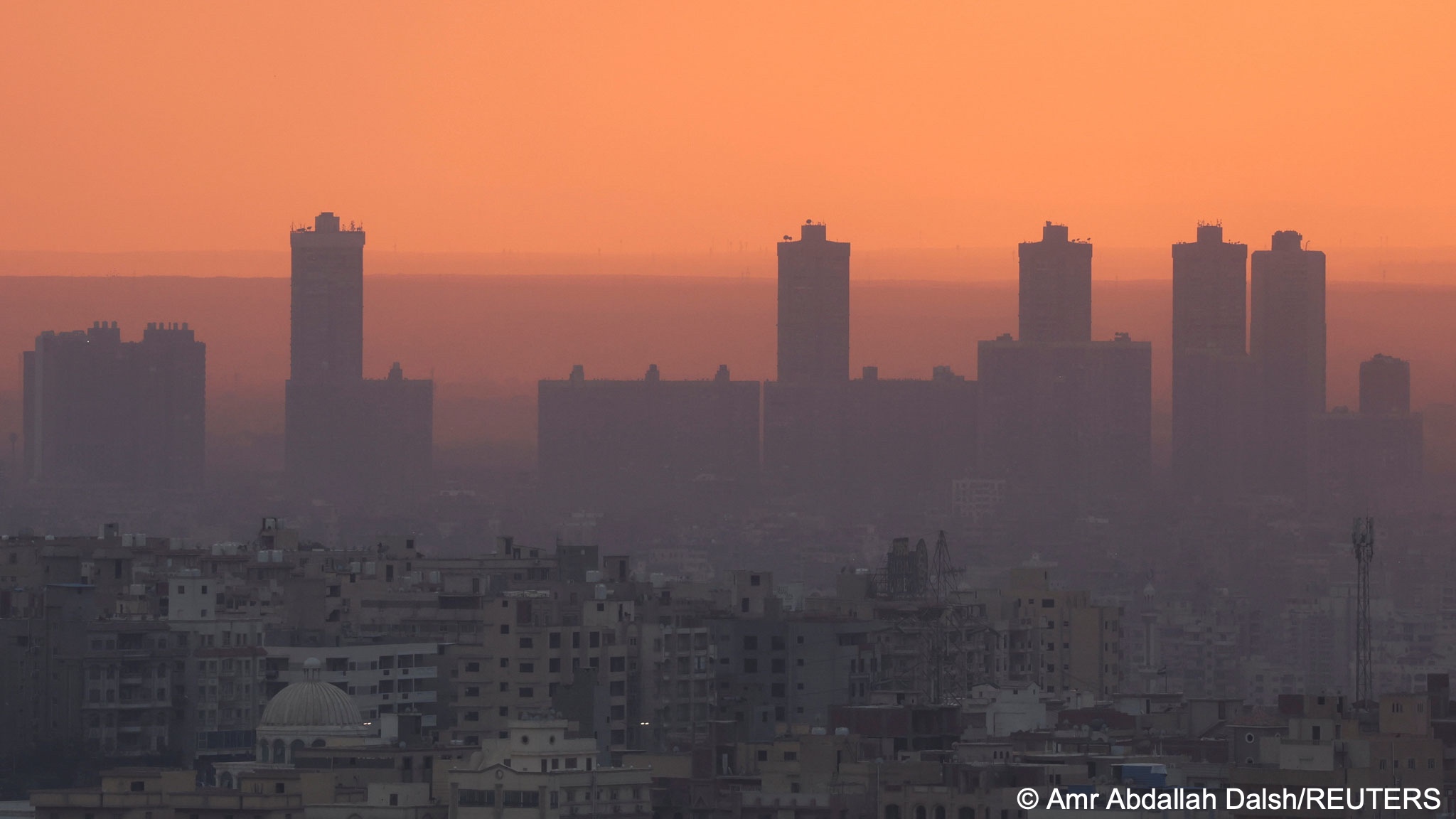 A general view of Cairo skyline during sunset, with foggy cold weather around the country, Cairo, Egypt, 2 February 2023 (image: REUTERS/Amr Abdallah Dalsh)