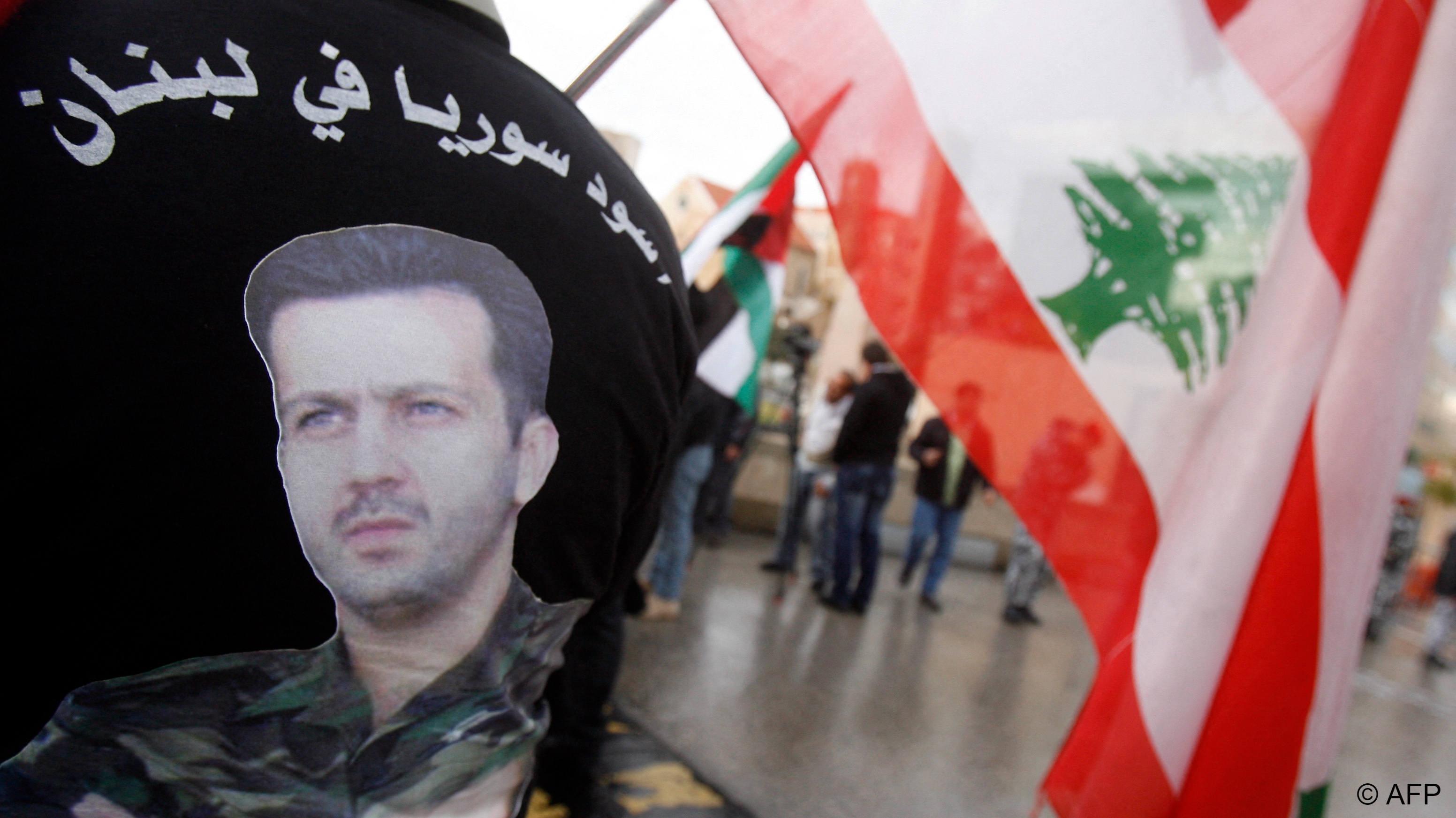 Key figure: a Lebanese man wears a T-shirt with a picture of Maher al-Assad at a pro-Syrian regime rally in Beirut in 2012 (image: AFP/File)