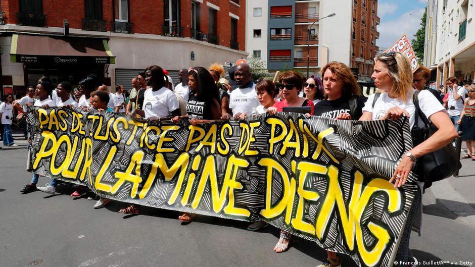 Demonstrators took to the streets in Paris in June 2017 to honour the memory of Lamine Dieng 10 years after his death (image: Francois Guillot/AFP via Getty)