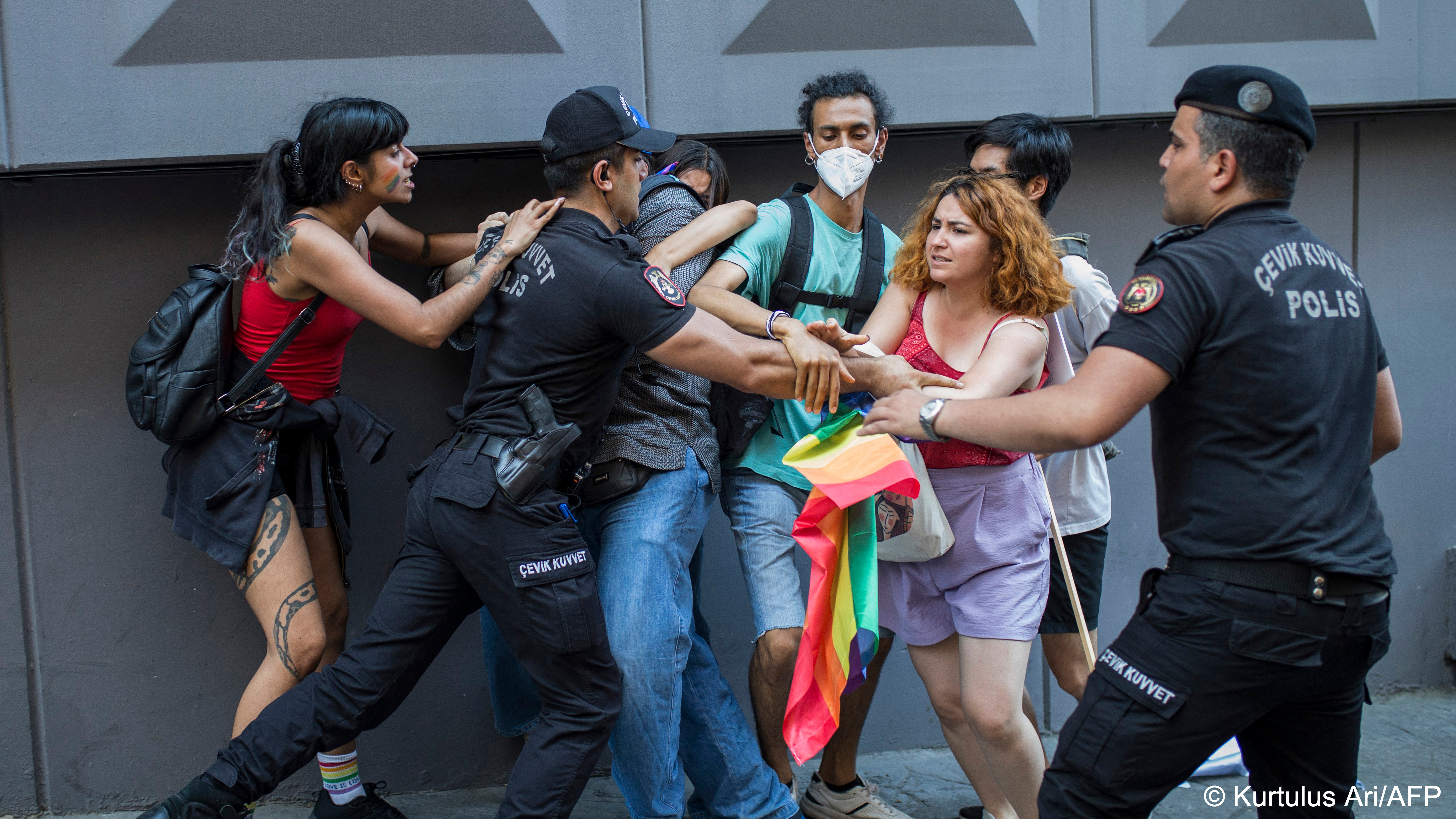 A Turkish policeman detains a demonstrator during a Pride march in Istanbul, 26 June 2022 (photo: Kurtulus Ari/AFP)
