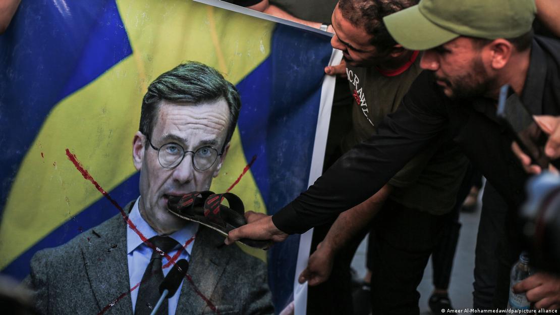Protest poster against Swedish Foreign Minister Billstrom in Baghdad (image: Ameer Al-Mohammedawi/dpa/picture alliance)