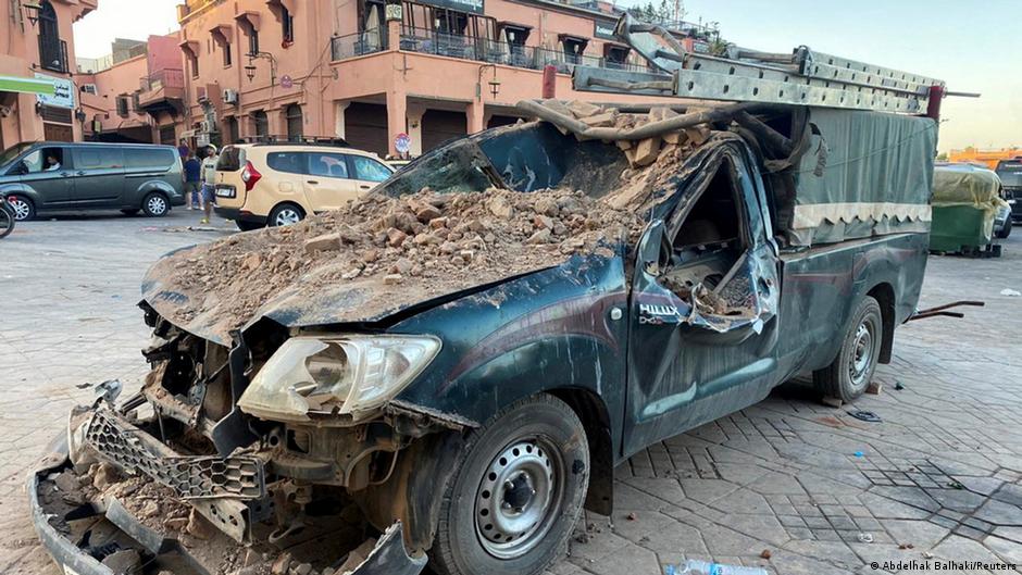 Car buried under rubble