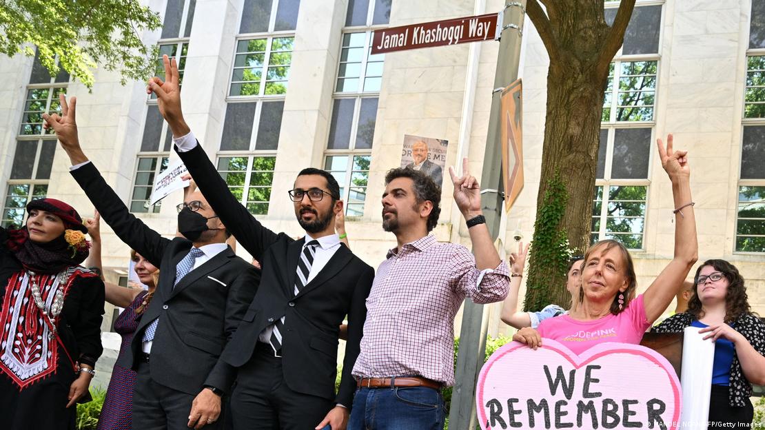 A street sign for Jamal Khashoggi Way is unveiled during a ceremony outside the Embassy of Saudi Arabia as guests listen to speakers in Washington, DC, United States, 15 June 2022 (image: MANDEL NGAN/AFP/Getty Images)