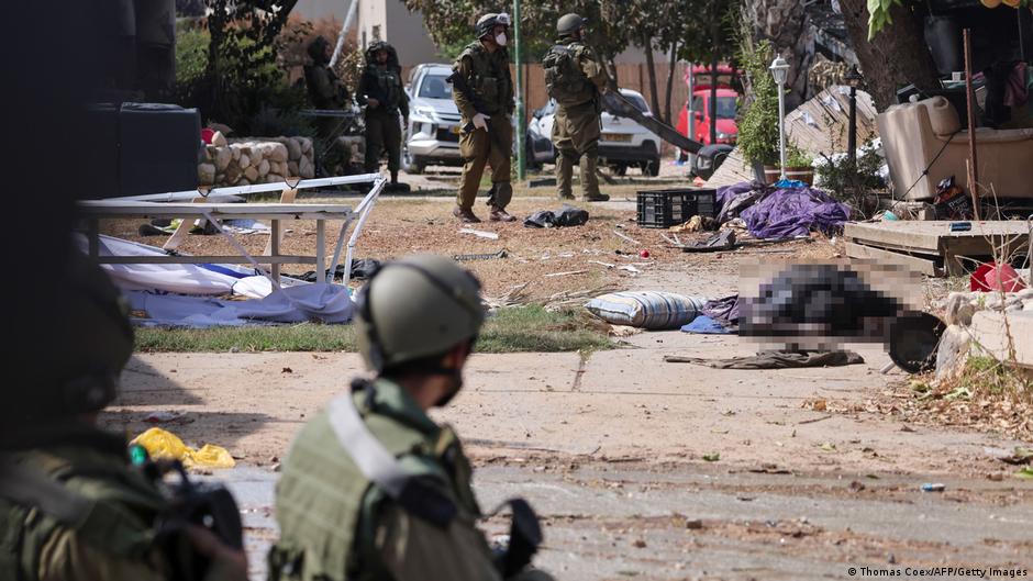 Israeli soldiers in Kfar Aza following the Hamas attack