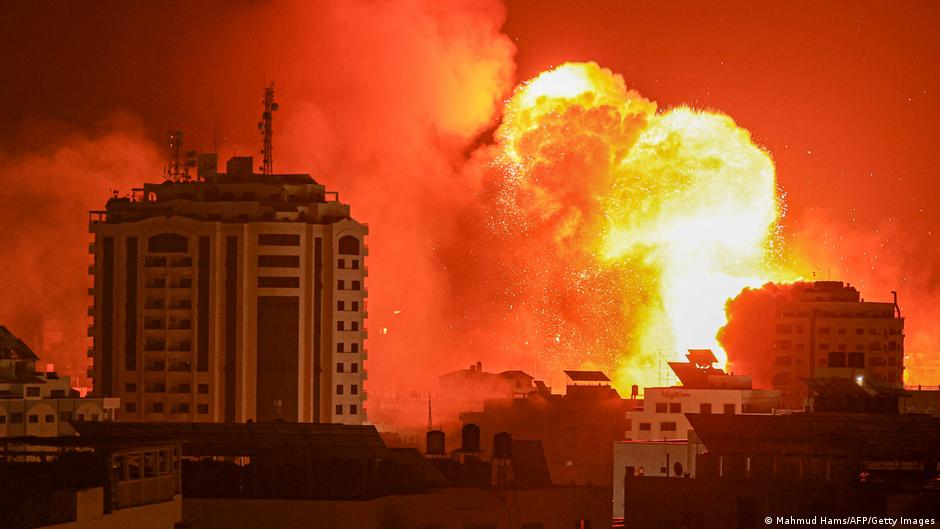 A fireball erupts from an Israeli airstrike in Gaza City 