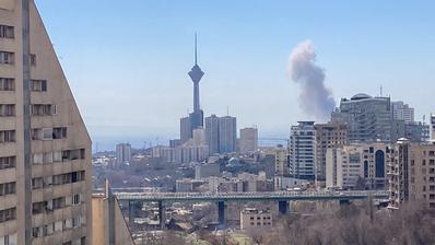 Plumes of smoke rise following reported explosions in Tehran on March 1, 2026. (Photo: picture alliance / Middle East Images | Fariba)