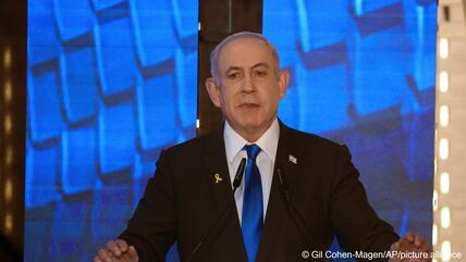 Israeli Prime Minister Benjamin Netanyahu addresses a ceremony marking Memorial Day for fallen soldiers of Israel's wars and victims of attacks, Jerusalem's Mount Herzl military cemetery, 13 May 2024