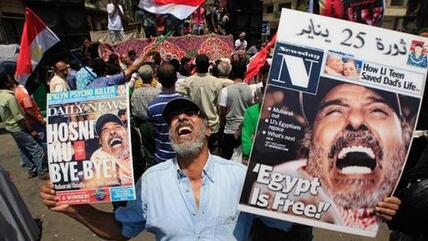 Demonstrator on Tahrir Square after Mubarak's ouster (photo: AP)