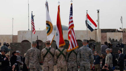 Ceremony in Baghdad marking the end of US military operations in Iraq (photo: AP)