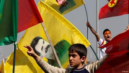 Kurds celebrating the announcement of the PKK peace plan in Diyarbakir (photo: Reuters)