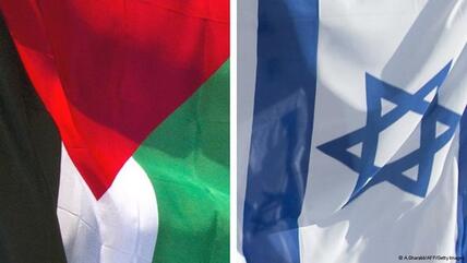The Palestinian and Israeli flags (photo: A. Gharabli/AFP/Getty Images)