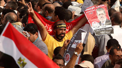Supporters of Mohammed Morsi at a pro-Morsi rally (photo: Reuters)