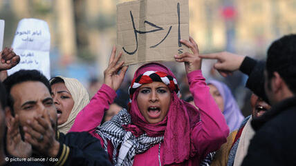 A woman during a rally on Tahrir square, Cairo, January 2011 (photo: dpa/picture-alliance)