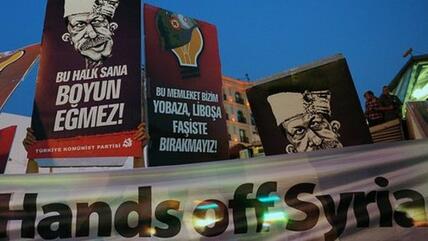  شعارات في اسطنبول تدعو إلى عدم التدخل في شوريا الصورة ا ب