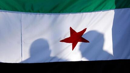 The flag of the Syrian opposition (photo: Reuters)