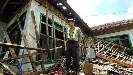 A destroyed Ahmadi home in Pandeglang, Indonesia (photo: AP)
