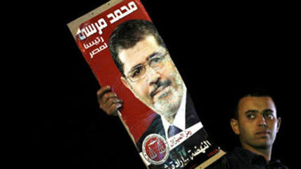 Supporter of Mohammed Mursi in Cairo (photo: Reuters)