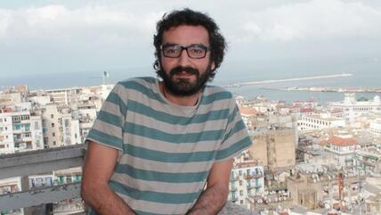 الكاتب والصحفي الجزائري عدلان مدي، الصورة مارلين توما  