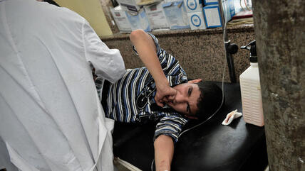 A boy injured during shelling by Syrian government forces is treated at a hospital in Aleppo (photo: Getty Images)