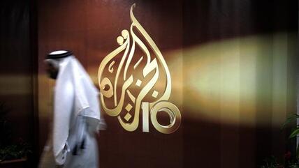 Employee at the Al-Jazeera headquarters in Doha, Qatar (photo: AP)