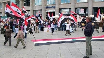 Syrian protesters in Cologne (photo: Deutsche Welle)