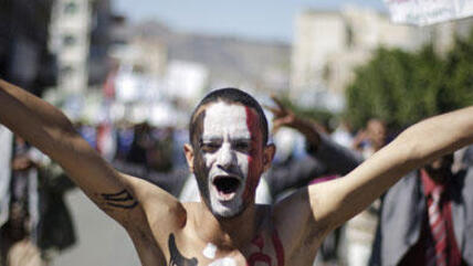 A demonstrator in Yemen (photo: AP)