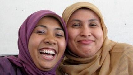 Two women wearing the headscarf (source: Inside Indonesia)