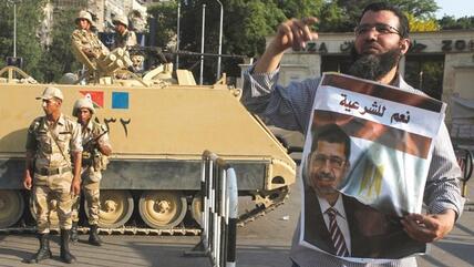 أحد أنصار مرسي في القاهرة. رويترز