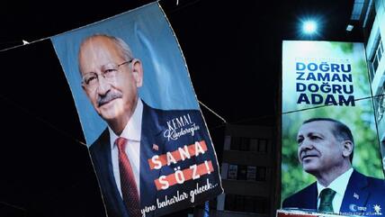 الرئيس التركي رجب طيب أردوغان (يسار) ومرشح المعارضة التركية كمال كليجدار أوغلو.
