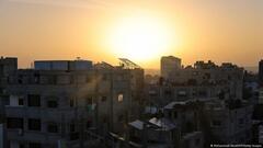Sun rises over buildings in Rafah in southern Gaza