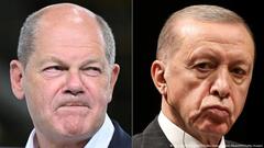 This combination created on 10 November 2023 using file pictures shows German Chancellor Olaf Scholz (left, on 22 August 2023 in Duren, western Germany) and Turkish President Recep Tayyip Erdogan (on 26 October 2023 in Ankara)