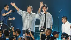 Prabowo Subianto (left) declares victory in Indonesia's presidential election