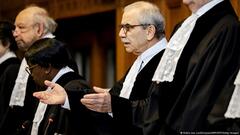 Nawaf Salam (centre), President of the International Court of Justice (ICJ), gestures as he opens the ICJ in a case filed by Nicaragua against Germany demanding judges impose emergency measures to stop Berlin providing Israel with weapons and other assistance, in the Hague 