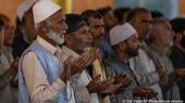 A group of Kashmiri Muslim men attending Friday prayers