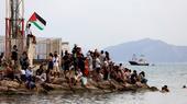 Demonstrators gather in Sidi Bou Said, Tunisia, to welcome the boats joining the Sumud Flotilla from Spain, 7 September 2025. (Photo: Picture Alliance / Anadolu | M. Mdalla)