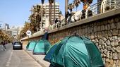 Displaced people live in tents along the seaside of Ramlet al-Baida on the Beirut Corniche in Beirut, Lebanon, on March 12, 2026, near the site where an Israeli strike reportedly targeted people sheltering in tents.