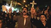 In this Tuesday, Oct. 4, 2011 file photo, Egyptian Copts hold Christian crosses and chant slogans as they demonstrate against the sectarian violence, in downtown Cairo, Egypt (photo: dapd)