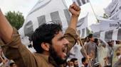 Anhänger der von den UN als Terrororganisation eingestuften Jamaat-ud-Dawa protestieren in Karachi gegen die US-Militäraktion, bei der Osama Bin Laden getötet wurde; Foto: dpa