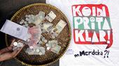 A t-shirt bearing the logo of the 'Coin for Prita' campaign (photo: NURANI NUUTONG/AFP/Getty Images)