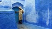 A kaleidoscopic melange, from powder blue to periwinkle, and pretty much everything in between, crafts the cobalt cityscape